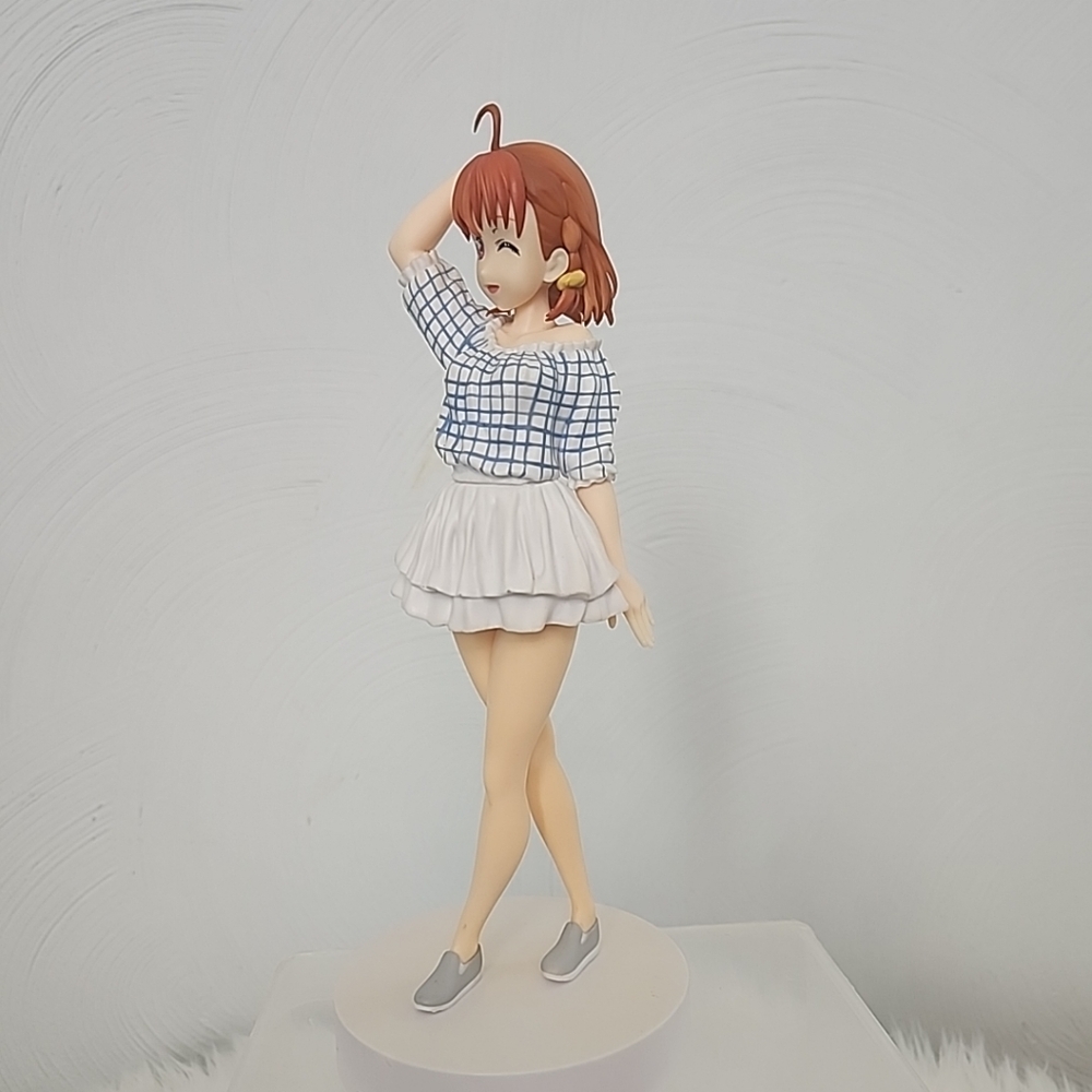 Anime Girl Figurine in Plaid Top and Skirt